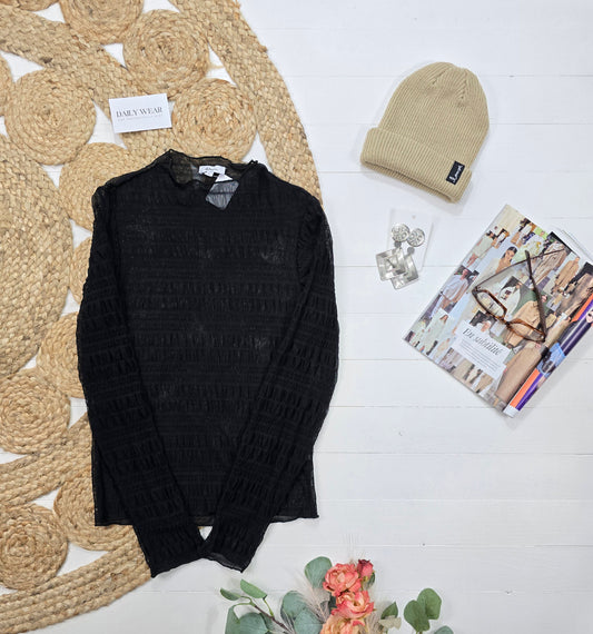 Haut Reitmans, Médium