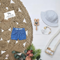 Short Tag, 6 mois