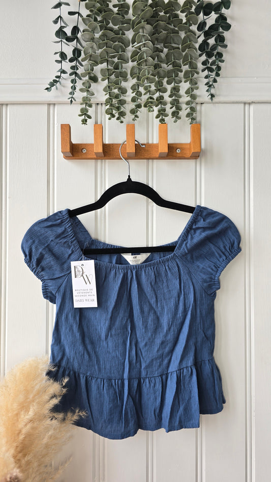 Haut H&M, 10 ans